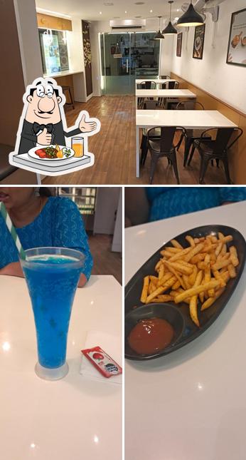 The photo of Aadhu's cafe’s food and interior