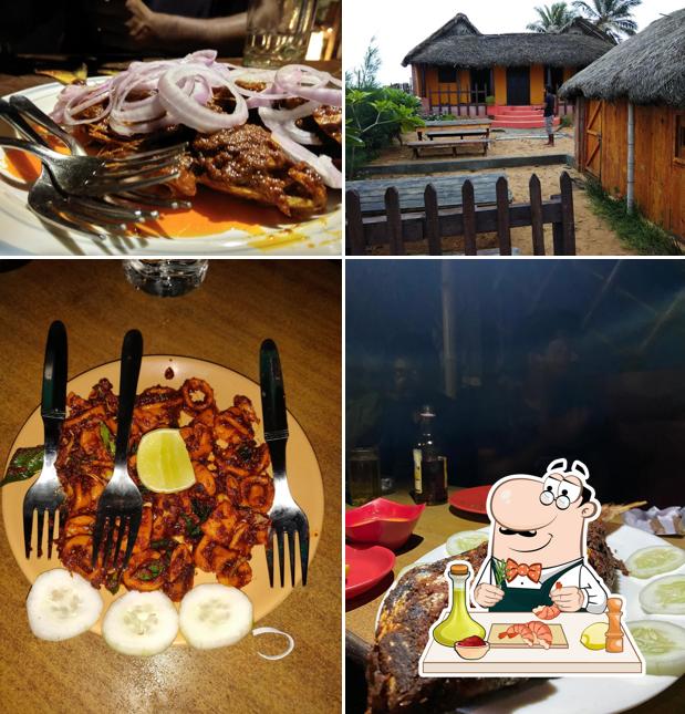 Try out seafood at Charlie's Den Seafood Beach Restaurant