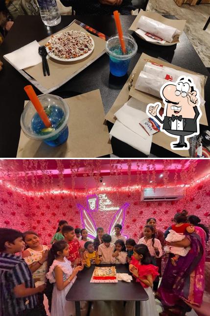 Take a seat at one of the tables at The Exotic Shawarma