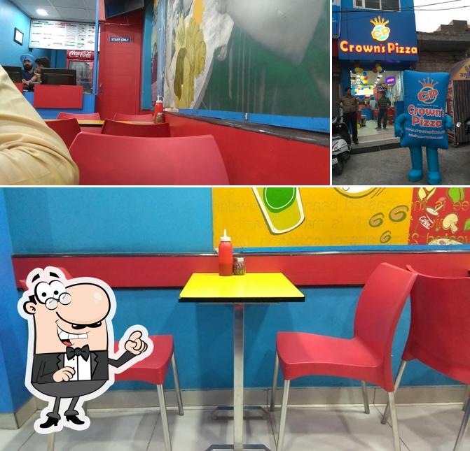 The image of Cafe Crown Pizza’s interior and exterior