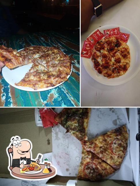 Try out pizza at The Yellow Balcao