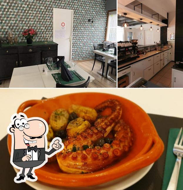 La foto della interni e cibo di Café Restaurant du Creux