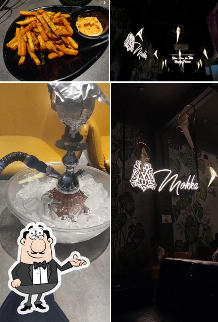 Take a seat at one of the tables at Mokka cafe & Restaurant
