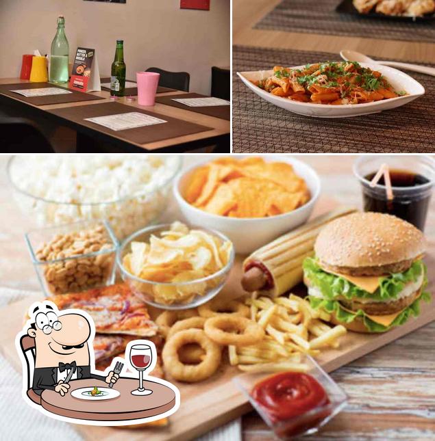 The photo of The 90s Kitchen & Restaurant’s food and interior