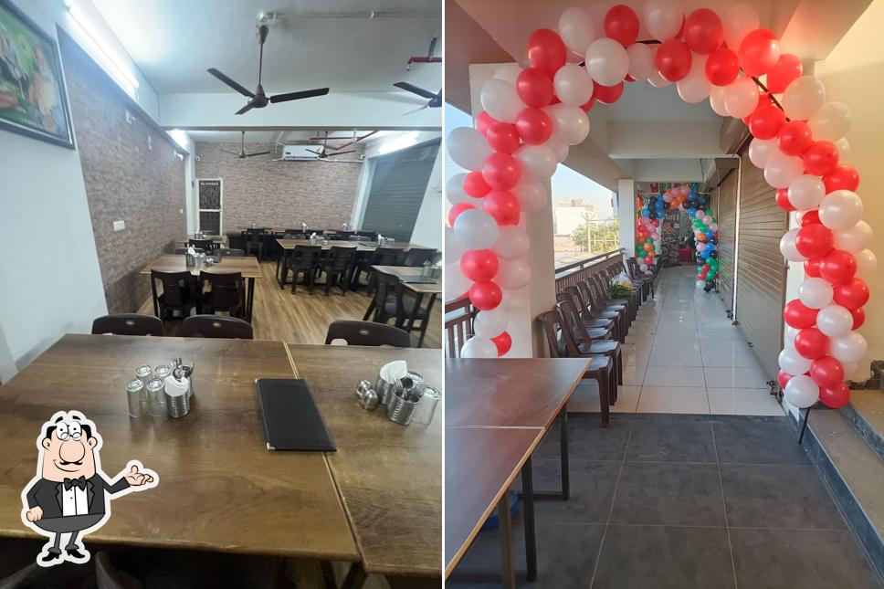 Take a seat at one of the tables at Krishna Chula Dosa Best Restaurant Chulha Restaurant Fast Food Restaurant Snacks Restaurant