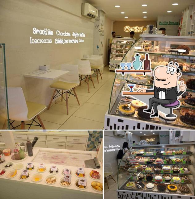 Take a seat at one of the tables at Oasiss Cakes, Chocolates, Icecream Cakes - Matunga