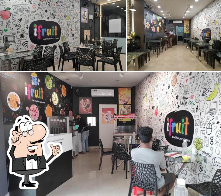 Take a seat at one of the tables at iFruit Live Ice Cream