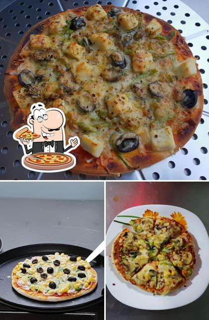 Order pizza at Aditi Foods group of New Kamakshi bhavan
