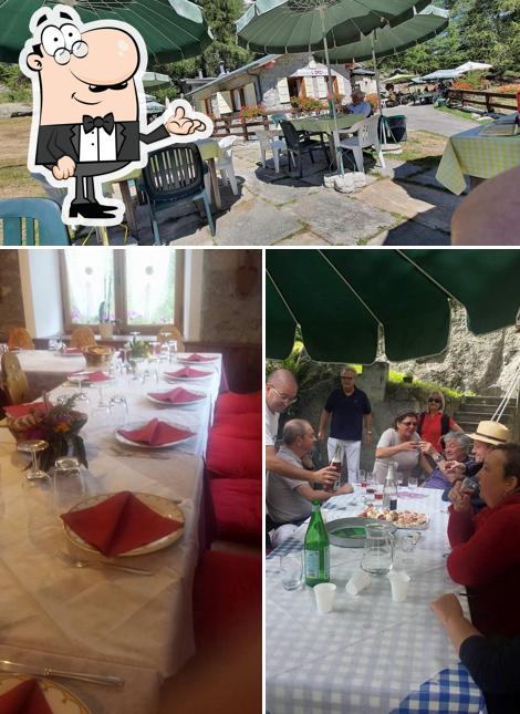 Siediti a un tavolo di Ristorante L'Oasi