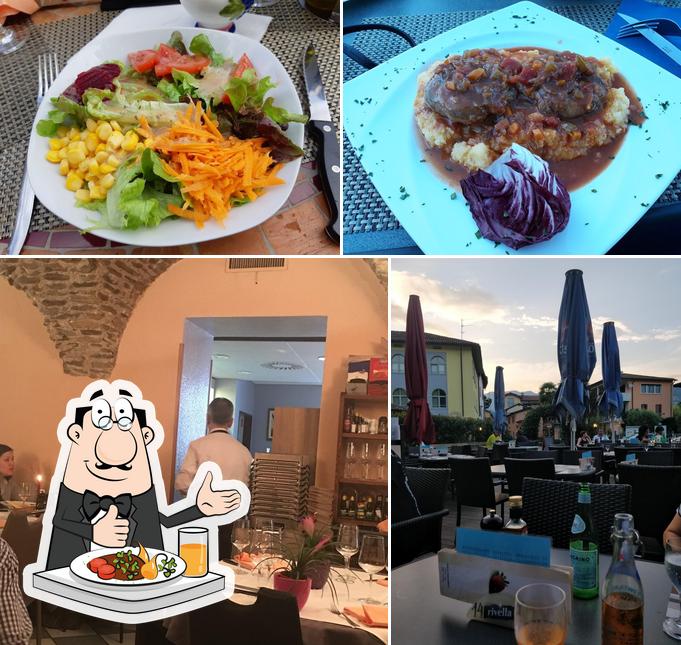 Guarda la foto che raffigura la cibo e interni di Osteria Debarcadero