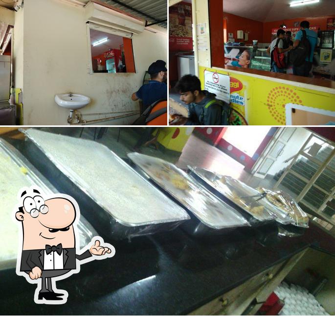 This is the image depicting interior and food at Ice 'n' Spice