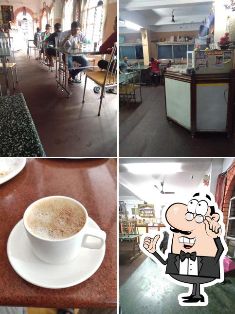 Take a seat at one of the tables at Mahaveer Bhojanalaya