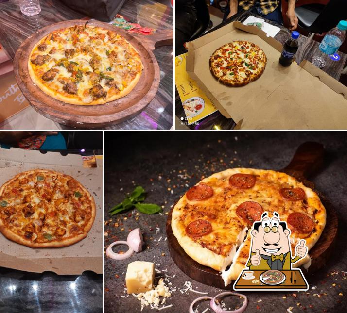 Get pizza at Gusto Pizza Suri