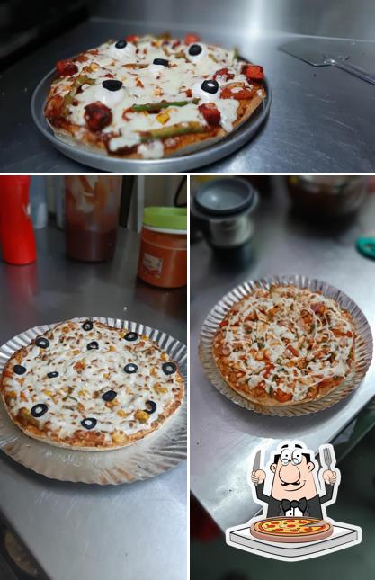 Try out pizza at PIZZA KING