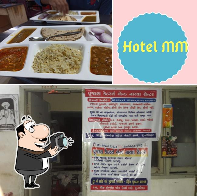 Look at the image of Manmohan Hotel