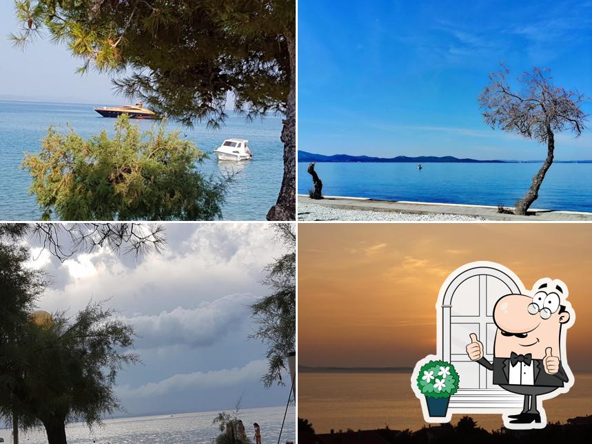 Goditi la vista dagli esterni di Caffe Bar Guam