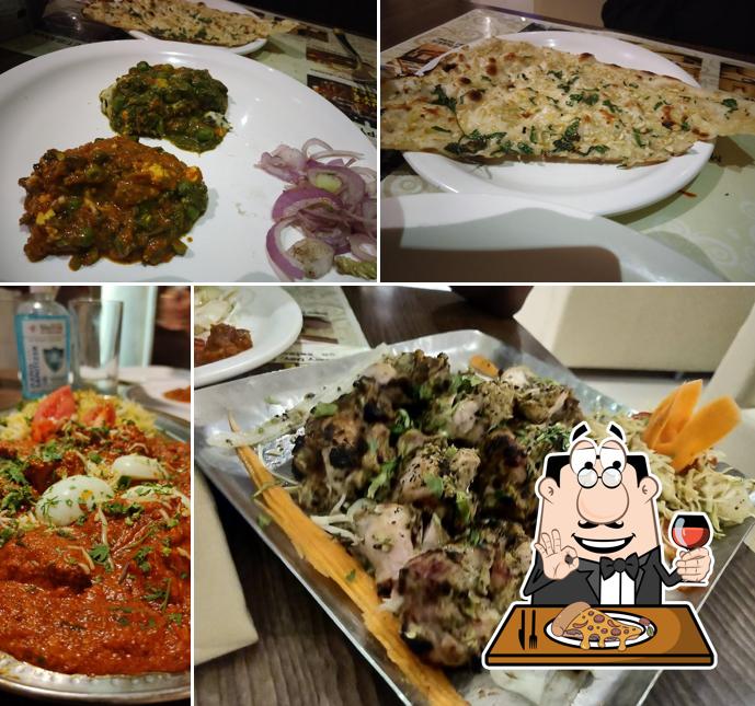 Pick pizza at Angrezi Dhaba Rest-o-Bar