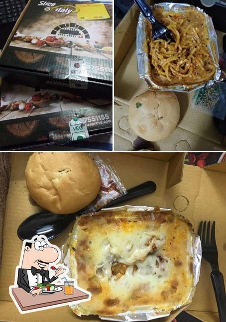 This is the photo depicting food and interior at Slice Of Italy