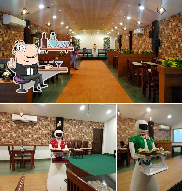 Take a seat at one of the tables at BE@KIWIZO ROBOTIC THEME RESTAURANT