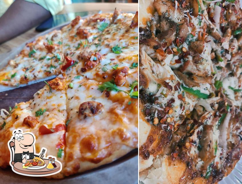 Get pizza at Candis Cafe