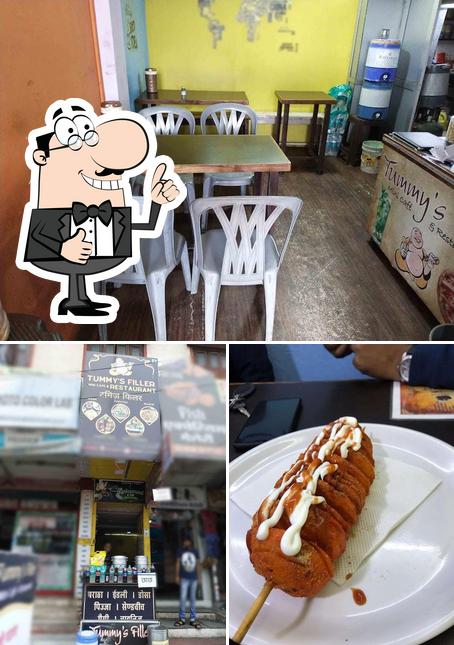 Look at the image of The tummy's 300ml rooftop cafe & restaurant (best restaurant)