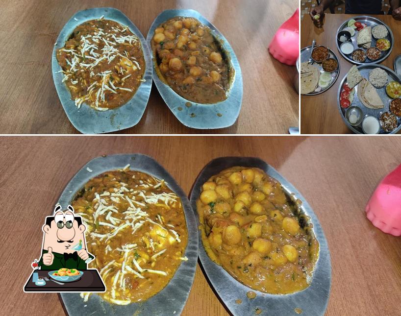 This is the image depicting food and interior at Shri Ambaji Restaurant
