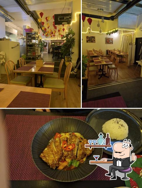 Questa è la immagine che raffigura la interni e cibo di Happy Wok