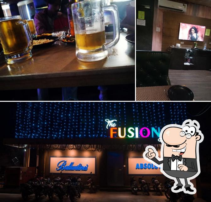 Check out the image displaying interior and beer at The Fusion Lounge