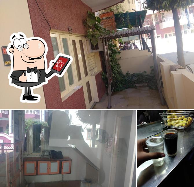 Among various things one can find exterior and beer at Gupta Mess & Tiffin Center
