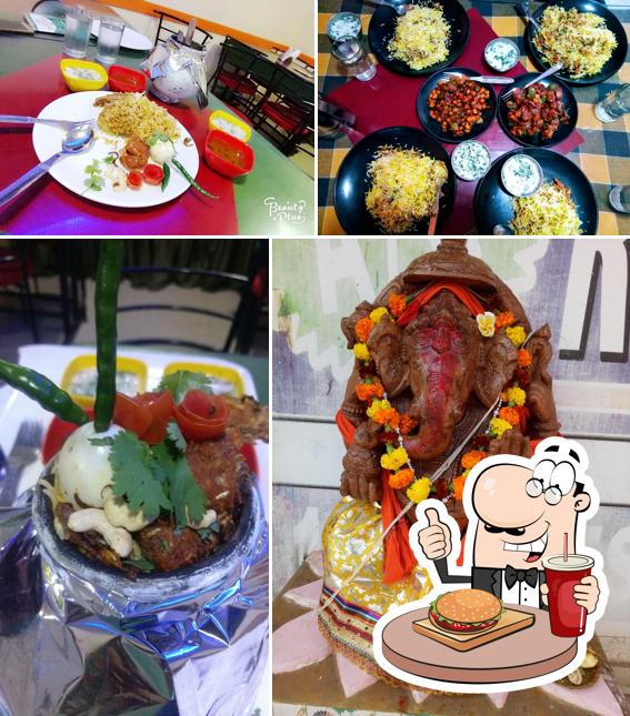 Get a burger at JAMUNA FAMILY RESTAURANT AND HOTEL A/C