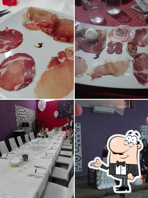 La immagine della interni e cibo di Sensation Disco Pub