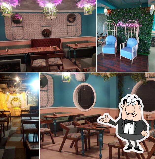 Take a seat at one of the tables at Famaa's Restaurant Dewas