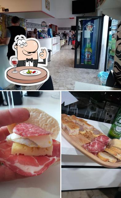 Questa è la immagine che presenta la cibo e interni di IL POSTO GIUSTO