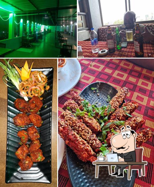 Take a look at the photo displaying interior and food at Sky Bar veg and nonveg Family and Restaurant