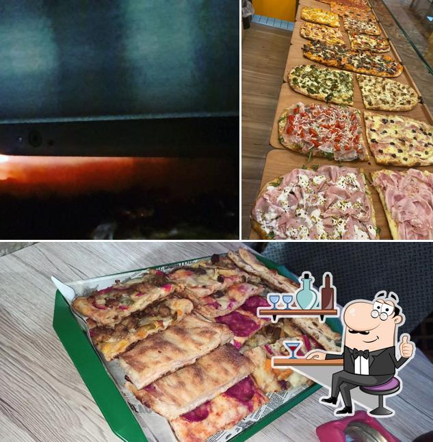 Guarda la immagine che presenta la interni e cibo di Scauri Pinsa