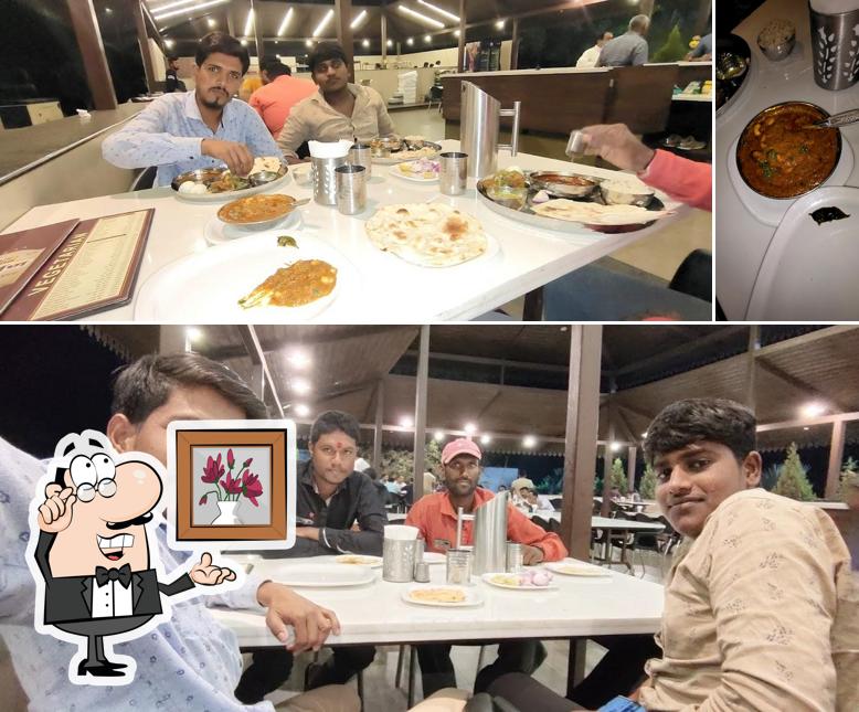 This is the photo showing interior and food at Hotel Gulmohar