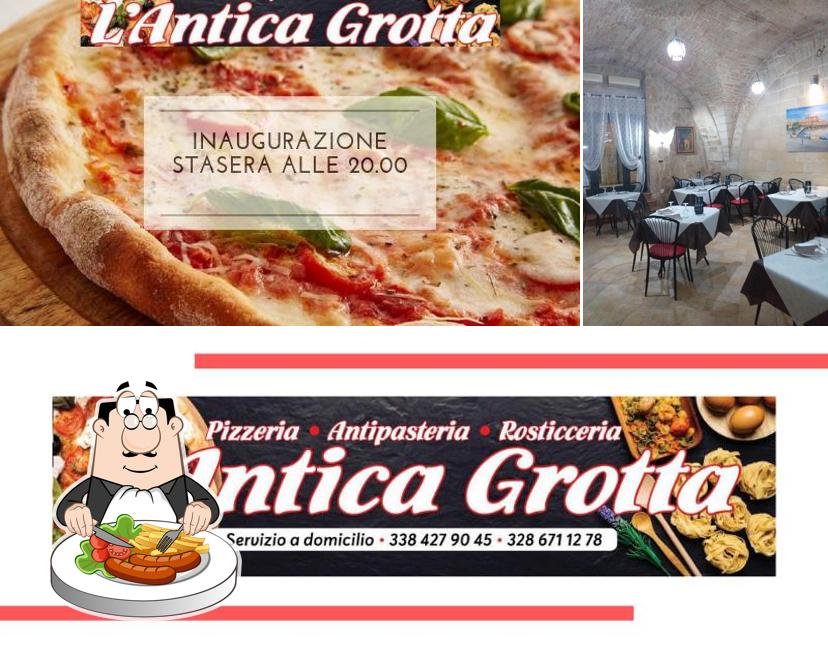 Pizzeria L' Antica Grotta si caratterizza per la cibo e interni