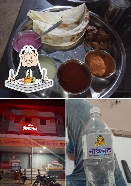 The photo of Hotel Maitri Gardan’s food and exterior