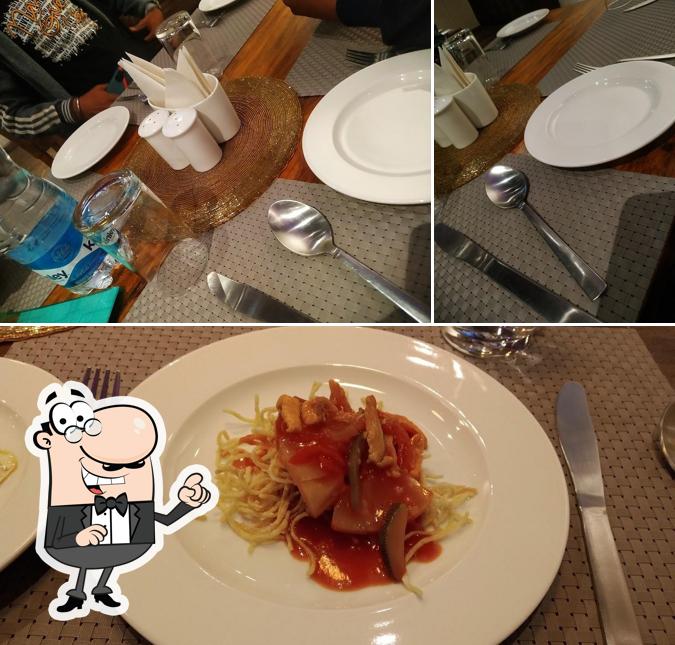Among different things one can find interior and food at Trisha Restaurant & Cafe