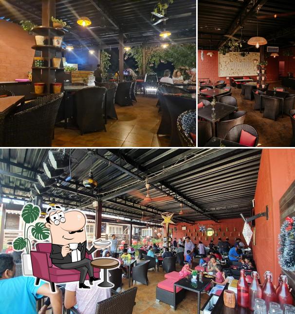 Take a seat at one of the tables at Monarch Lounge & Restaurant