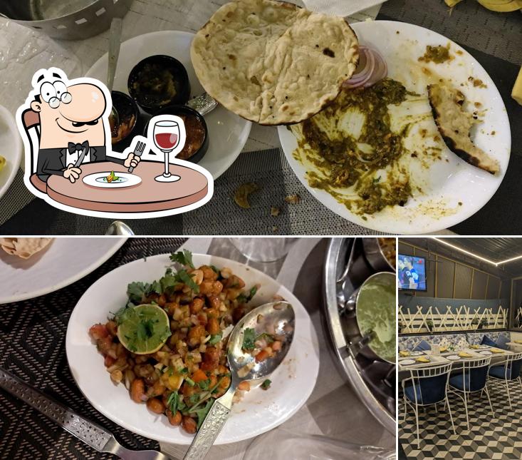 This is the picture depicting food and interior at Pithora Restaurant