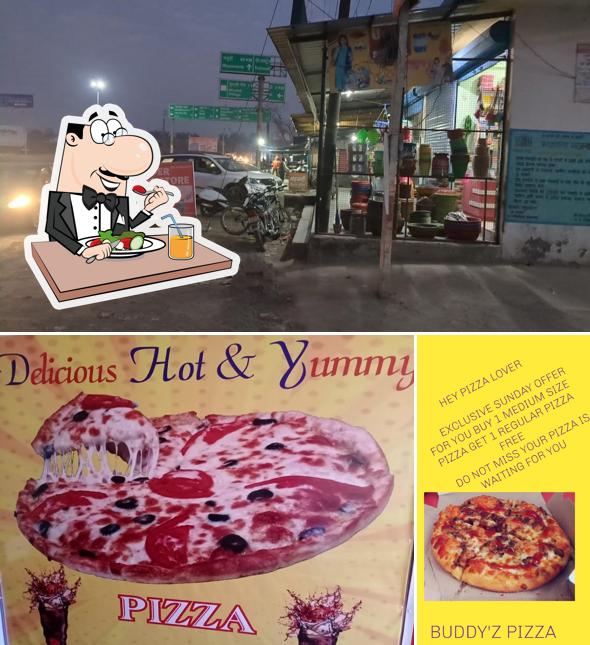 Take a look at the image displaying food and exterior at Buddy'z pizza