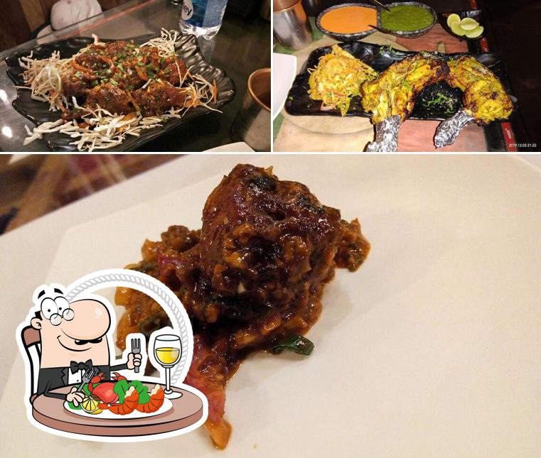 Order different seafood dishes offered by Tandoor Tawa aur Karahi