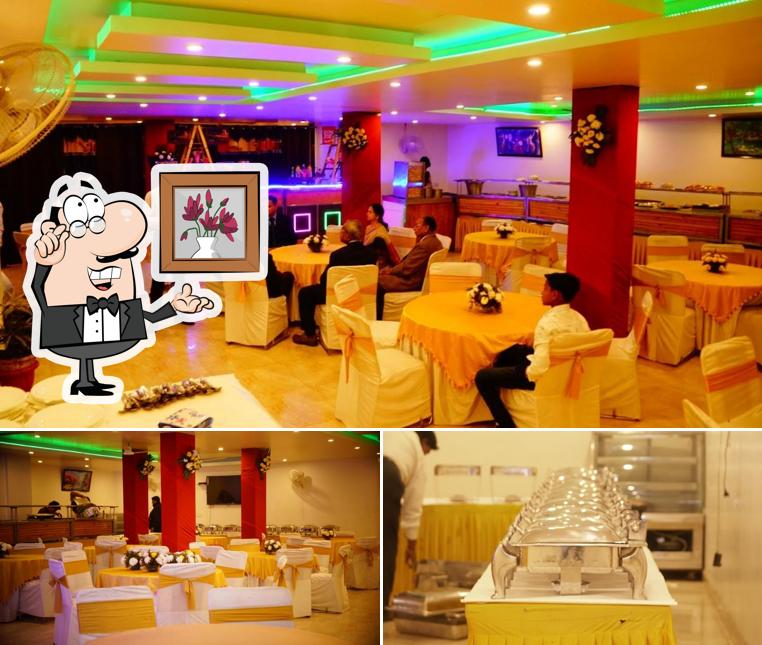 The picture of interior and cake at Food Ganesha