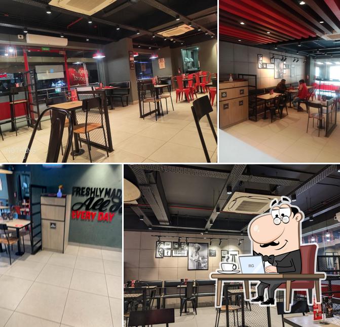 Take a seat at one of the tables at KFC