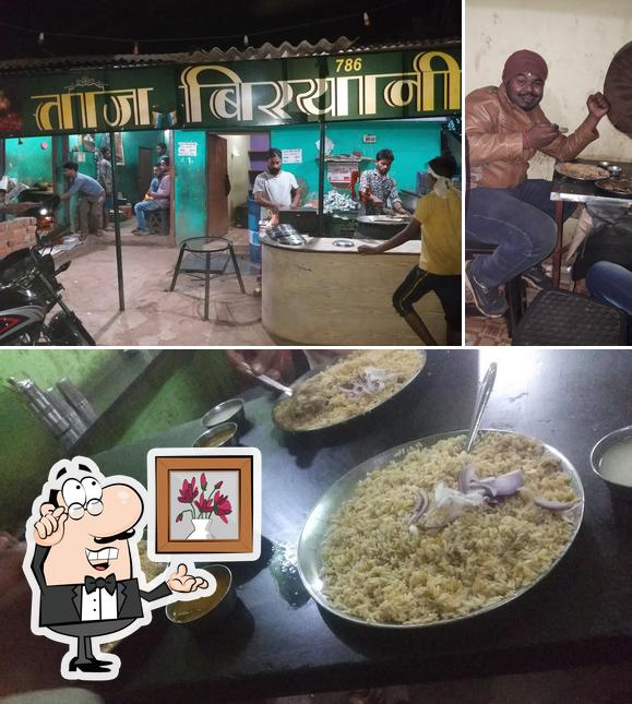 Among various things one can find interior and food at Taj Biryani Center