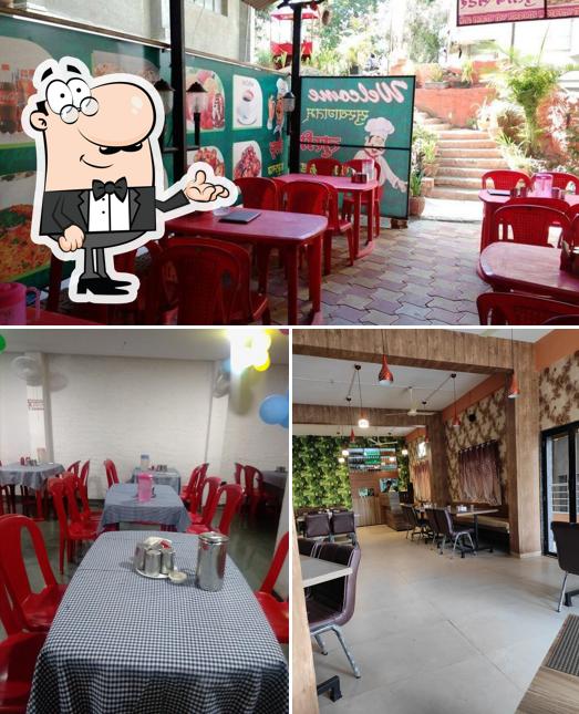 Take a seat at one of the tables at Trupti Veg