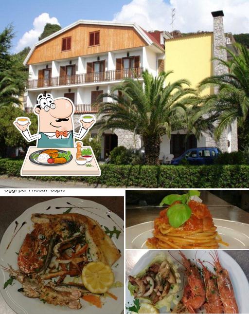 La immagine di cibo e esterno da Park Hotel Ristorante Albergo