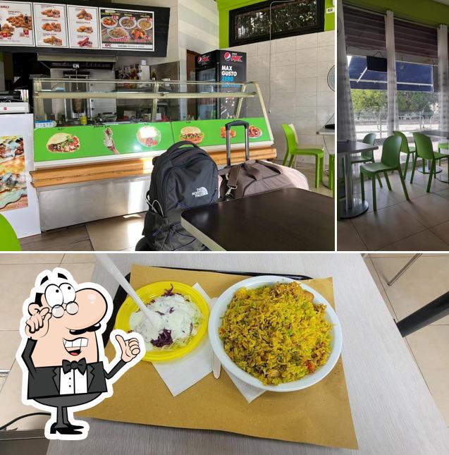 Dai un’occhiata alla foto che mostra la interni e dolce di KPC -( kebab pizza chicken)Fast food restaurant