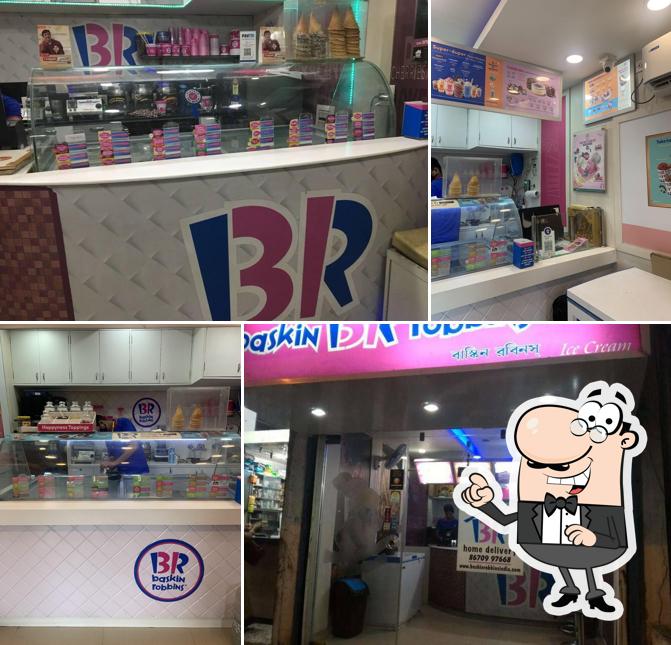 Take a seat at one of the tables at Baskin Robbins - Ice Cream Desserts